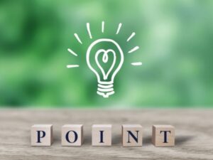 電球のイラストとPOINTと書かれた木製ブロック